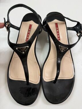 Prada Black Patent Leather T-Strap Sandals with Logo Plaques